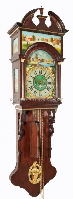 A Friesland wall clock with painted panels decorating the hood. A wedding clock with an alarm. 217043A.