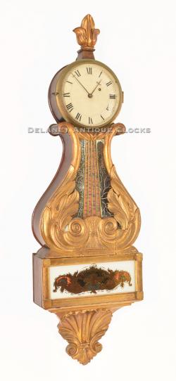 Attributed to the Newburyport, Massachusetts clockmaker David Wood. A gilt lyre timepiece. 217048.