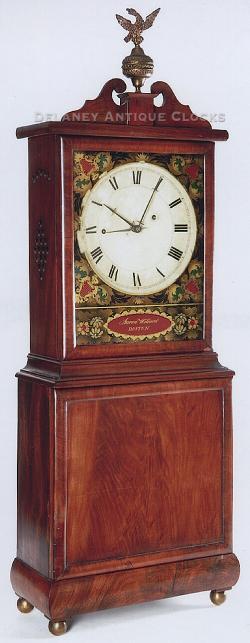 Aaron Willard made this Massachusetts Dish-Dial Shelf Clock. This is an unusual example in that it features an alarm, and the case was constructed by his son, Henry Willard. TT-172.